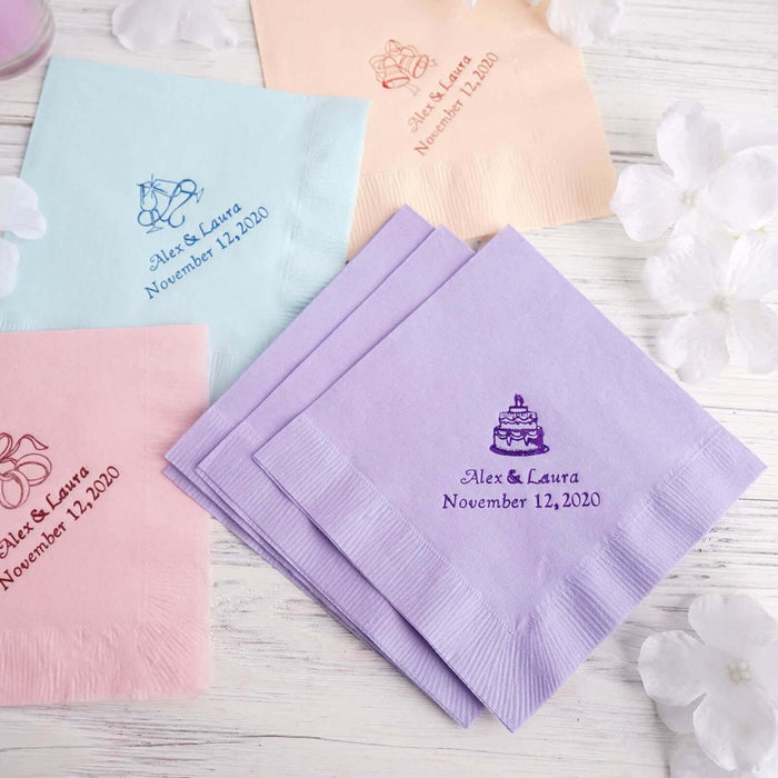 Personalized wedding napkins in pastel colors with custom text and designs.