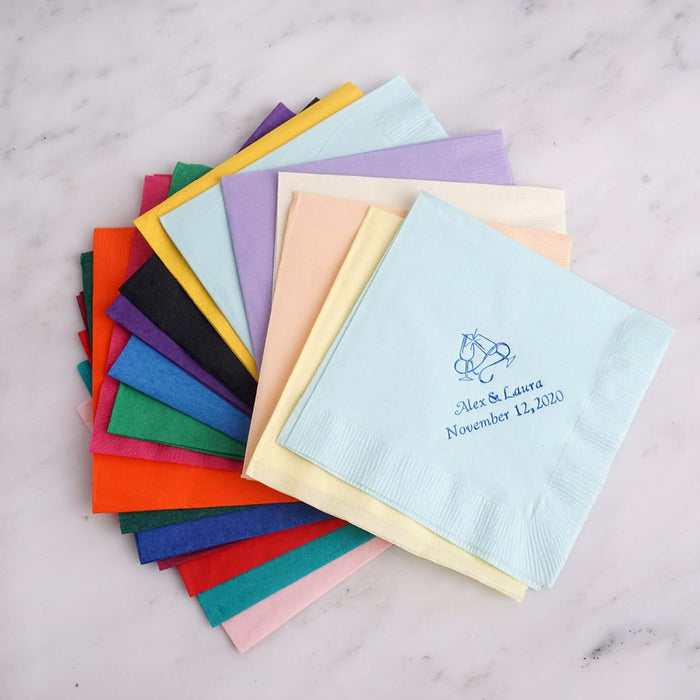 Colorful personalized napkins in various shades, featuring custom text.