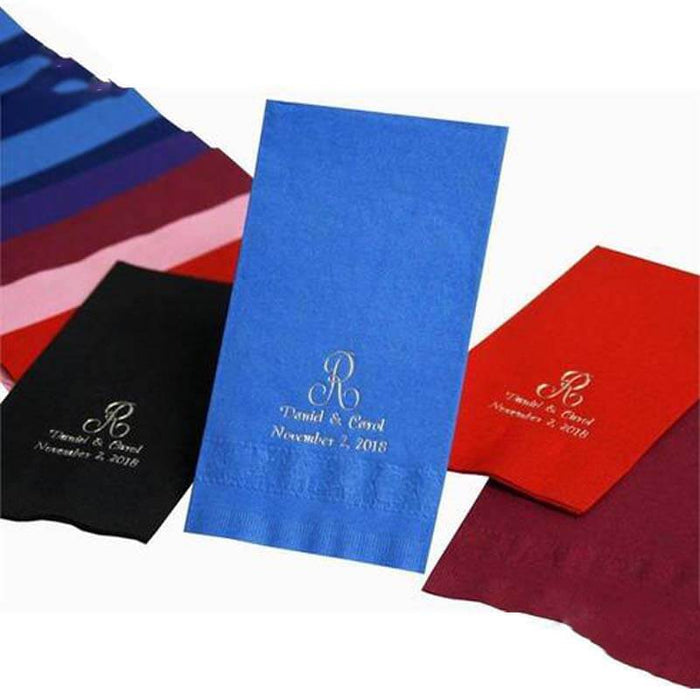 Personalized napkins in various colors for events, featuring a custom design.