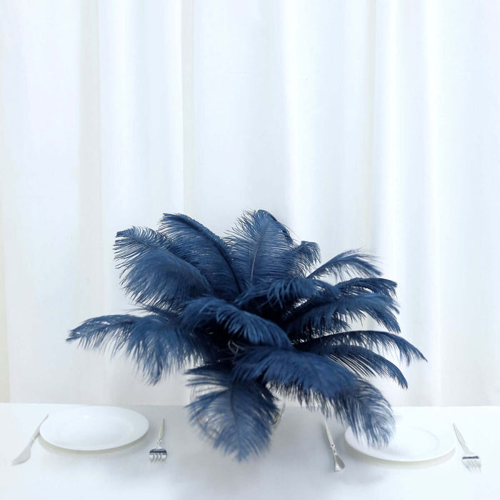 Navy blue feather centerpiece on a dining table