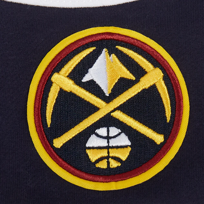 Close-up of a circular embroidered Denver Nuggets team logo patch featuring crossed pickaxes and a basketball