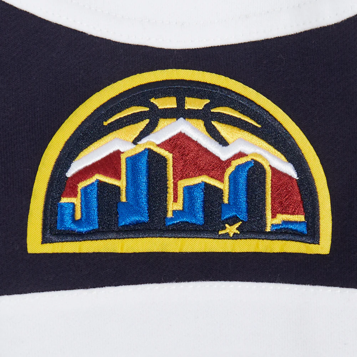 Close-up of a Current Skyline Logo, featuring colors of red, white, yellow, navy and royal blue embroidered patch
