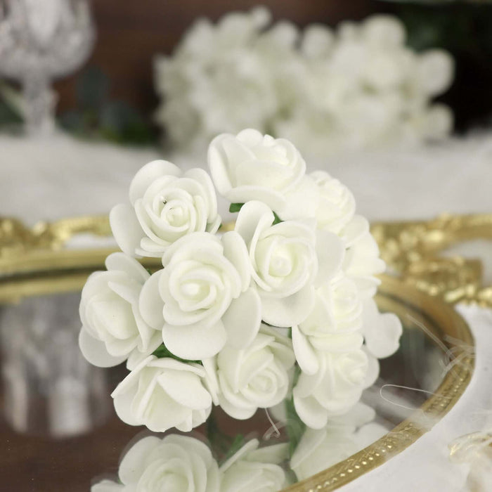 White rose bouquet on a reflective surface