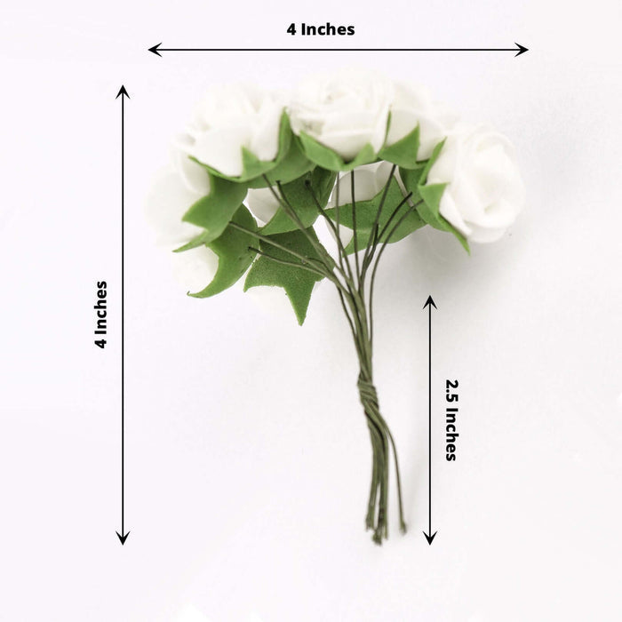White flower bouquet with green leaves, 4 inches wide and 2.5 inches tall.
