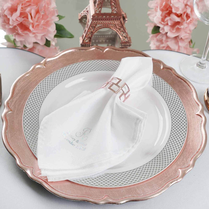 Elegant table setting with a white napkin and decorative plate.