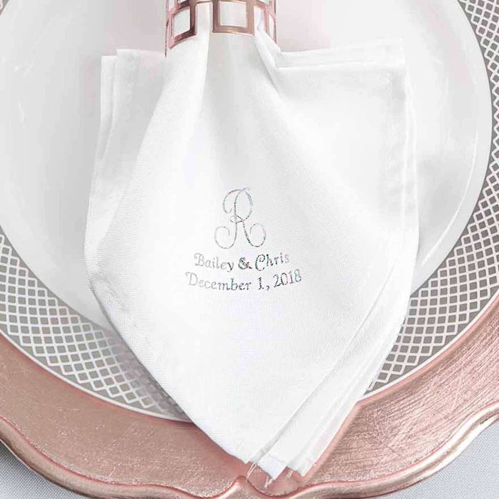 Personalized white napkin with elegant embroidery, perfect for weddings. #whtbkgd