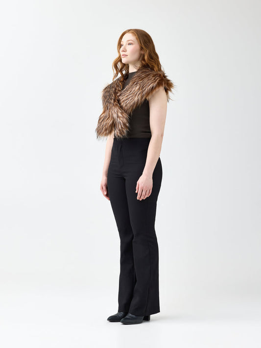 Woman wearing a brown faux fur wrap scarf on a white background