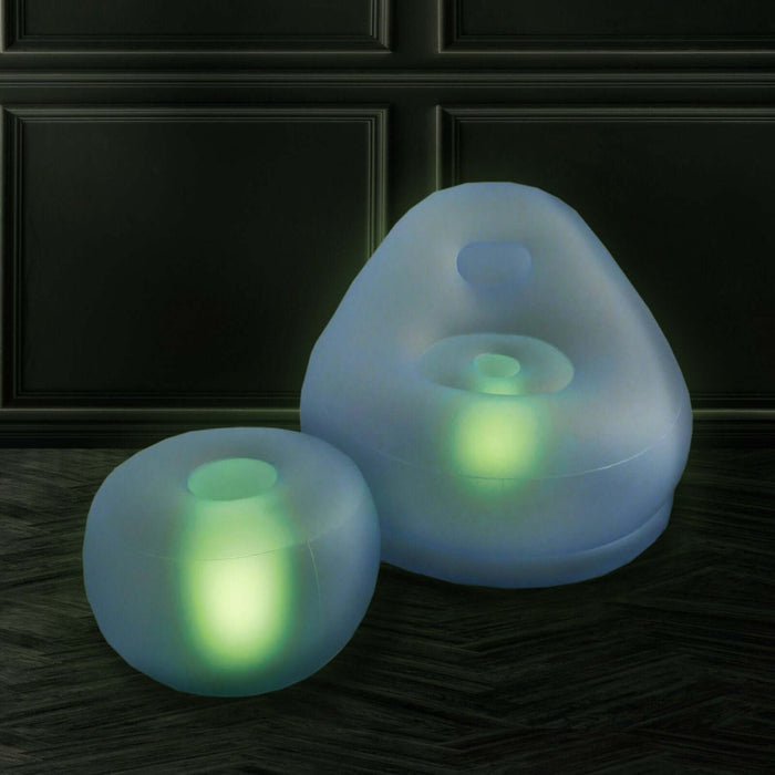 Inflatable glowing lounge chair and ottoman set in soft blue color.