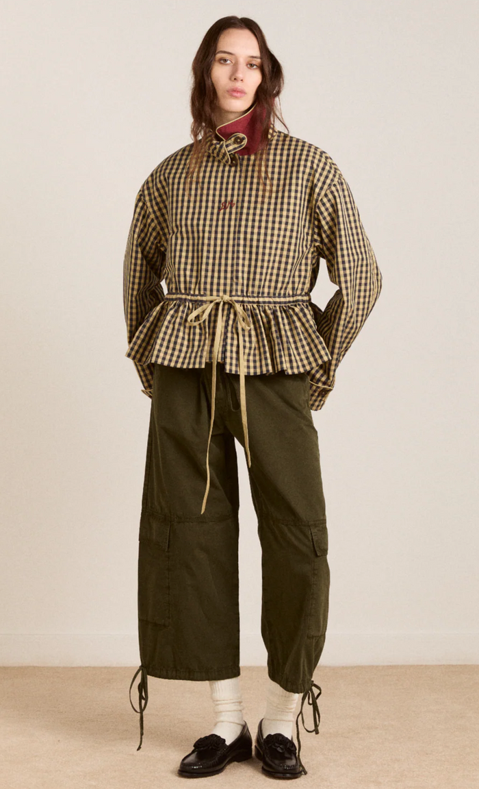 Woman wearing Damson Madder Myrtle Trench in Gingham against a white background