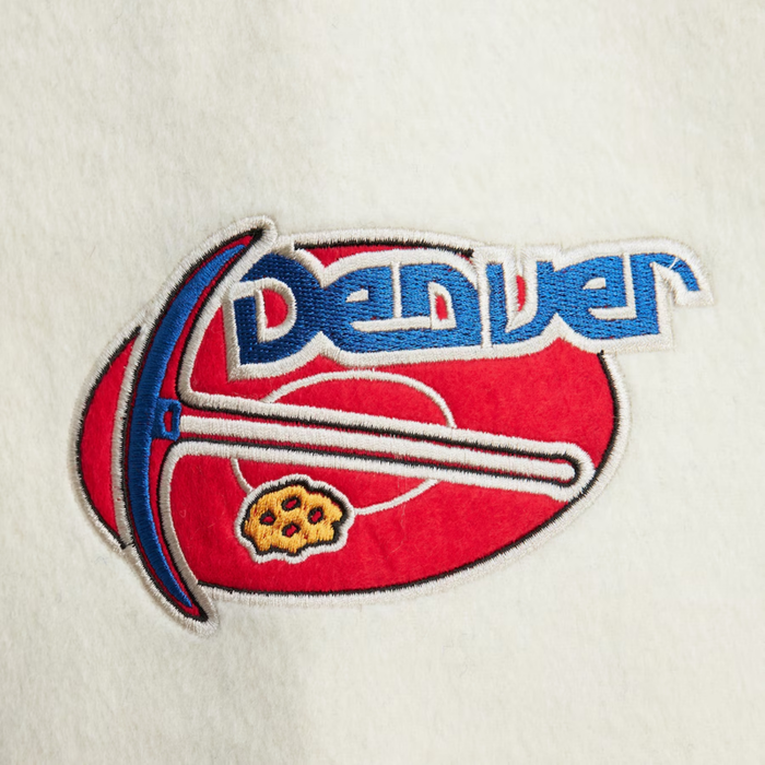 Up Close view patch on the sleeve featuring a pickaxe logo over a red oval with the word "DENVER".