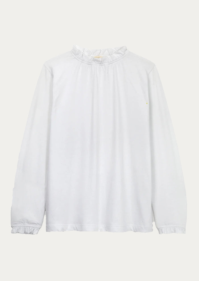 White blouse with long sleeves on a light gray background