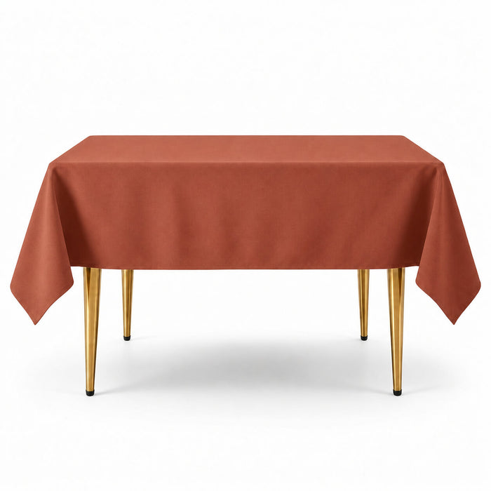 Terracotta wrinkle-resistant square tablecloth 70"x70" on a table.