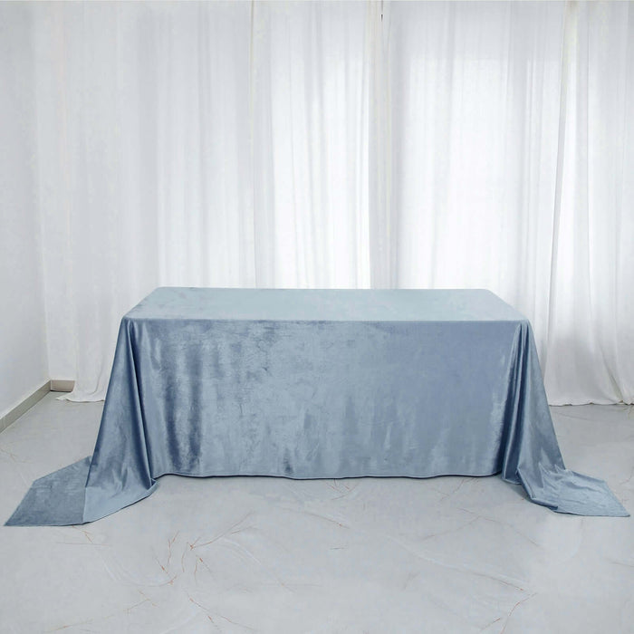 Light blue tablecloth on a table in a bright, airy setting.