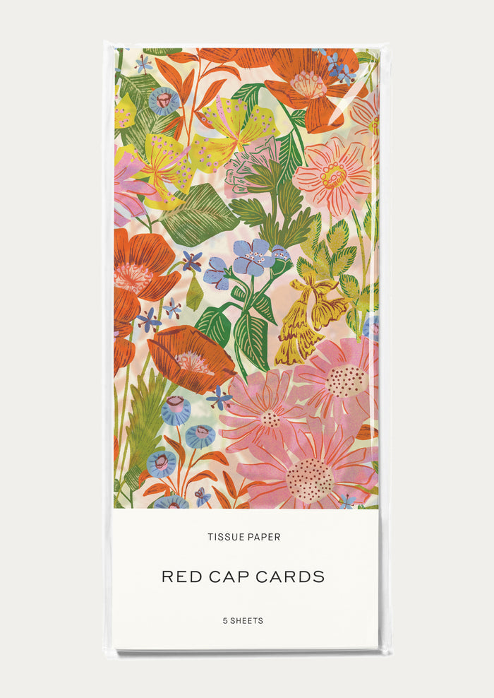 Floral tissue paper packaging with 'Red Cap Cards' branding on a white background