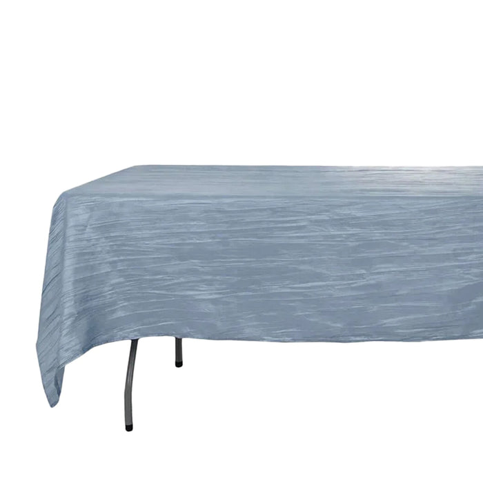 Blue textured tablecloth on a folding table