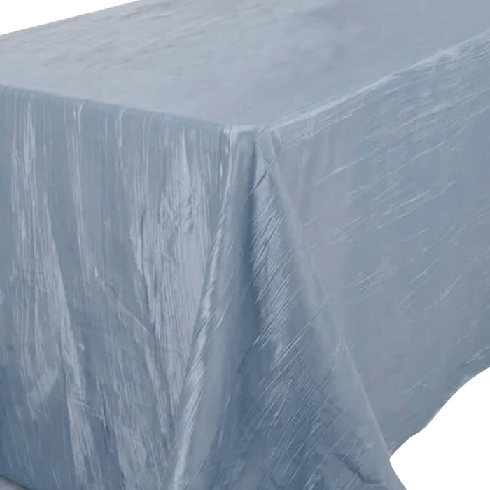 Light blue tablecloth with a textured finish, elegantly draped.